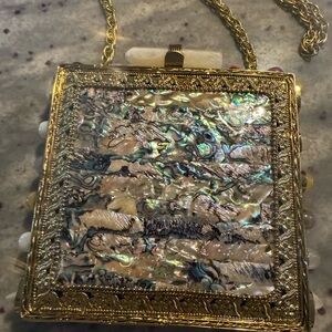 Iridescent Ramla prestige the opal muse in brass clutch with chain